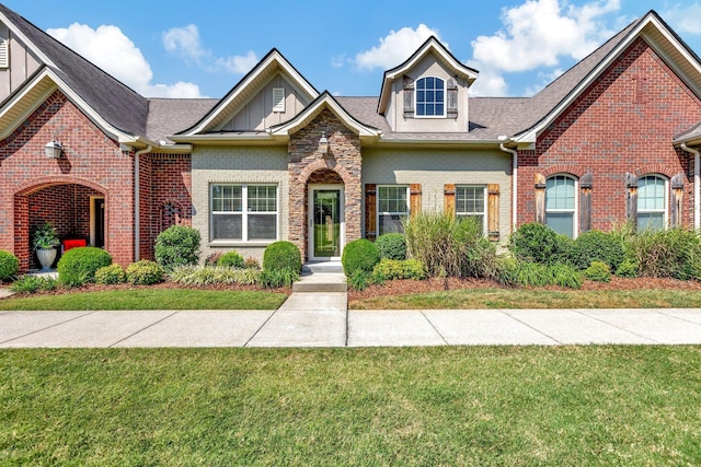 view of front of home with a front lawn