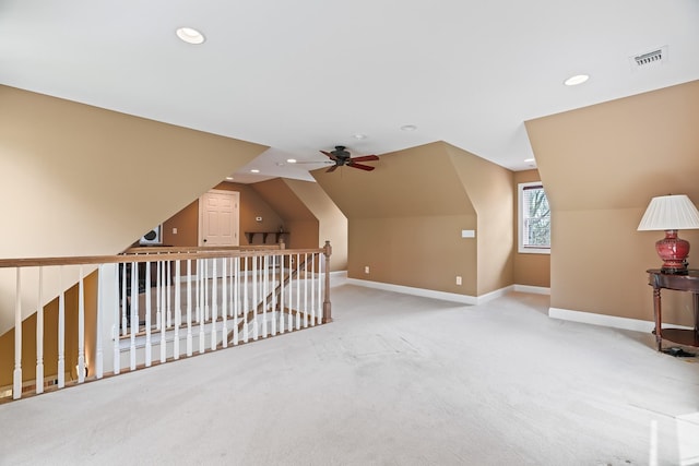 bonus room with carpet, ceiling fan, and lofted ceiling