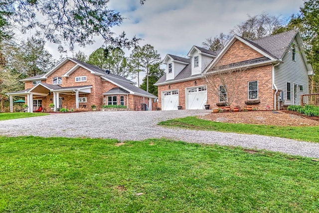 view of front of home featuring a garage and a front lawn