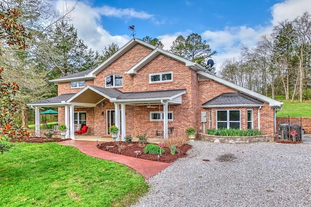 view of front of property with a front lawn and a porch