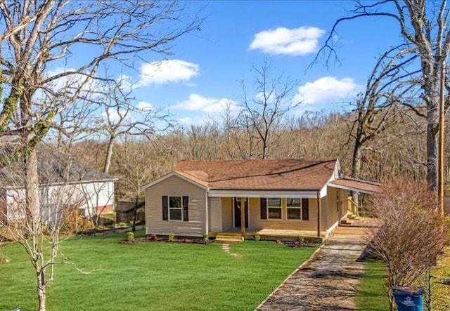 view of front of house with a porch and a front lawn