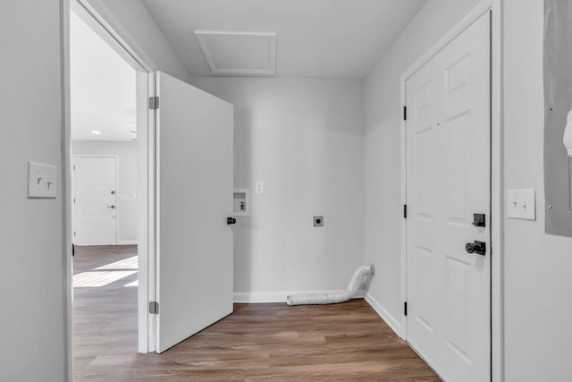 laundry area featuring hookup for an electric dryer, washer hookup, and light hardwood / wood-style flooring