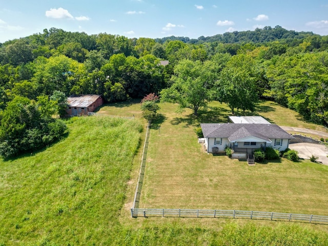 birds eye view of property featuring a rural view