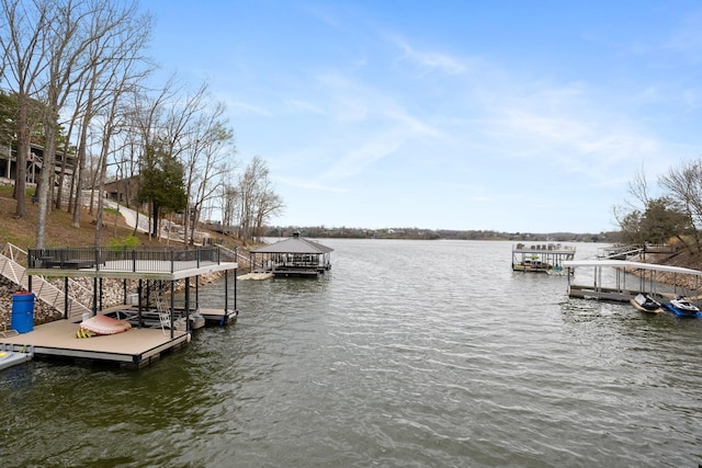 view of dock with a water view