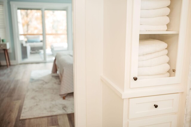 interior details with hardwood / wood-style flooring