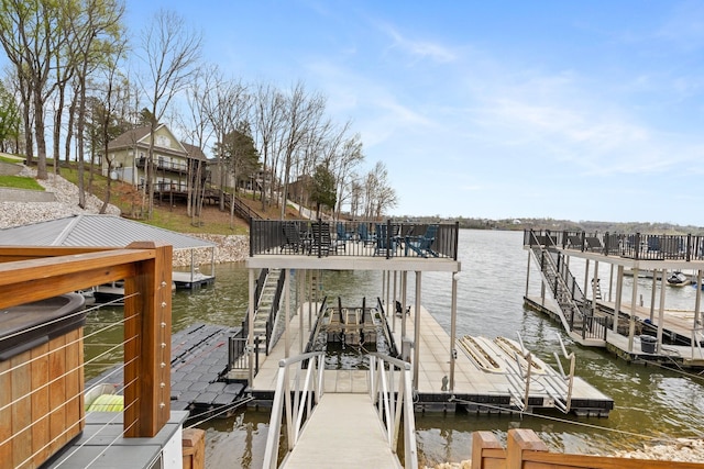 view of dock with a water view