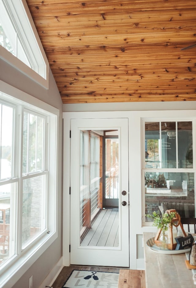 entryway with wooden ceiling and lofted ceiling