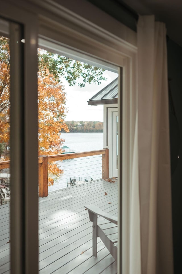 entryway featuring a water view