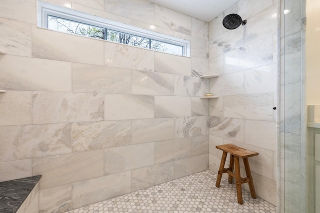 full bathroom featuring a tile shower