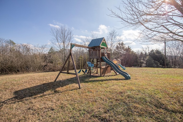 view of jungle gym with a lawn