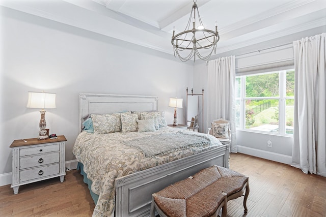 bedroom with beam ceiling, a chandelier, crown molding, and wood-type flooring