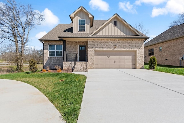 craftsman house with a garage and a front yard