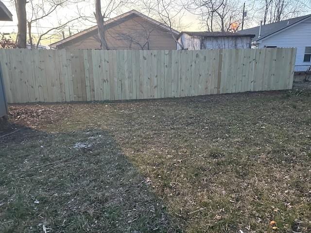 view of yard featuring fence