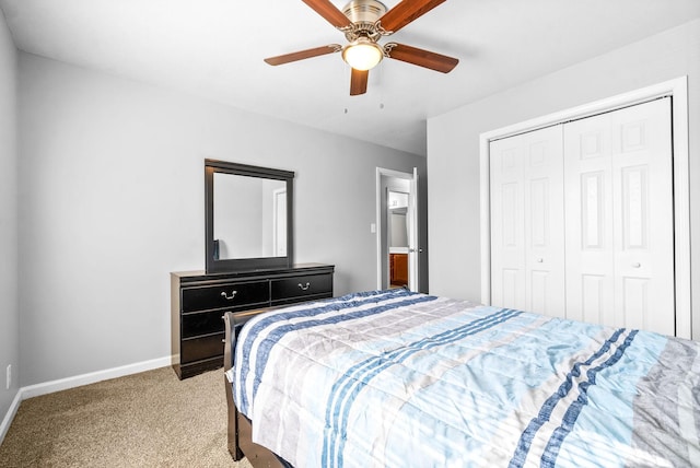 bedroom with a closet, light colored carpet, and ceiling fan