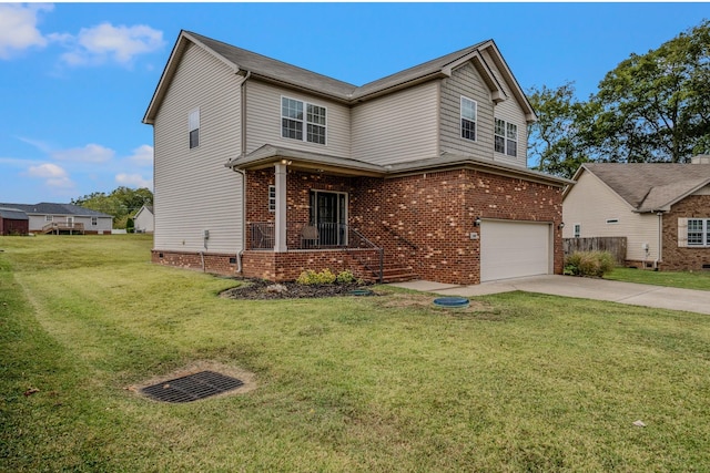 view of front facade with a garage and a front lawn