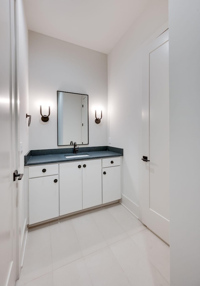 bathroom featuring vanity and tile patterned floors