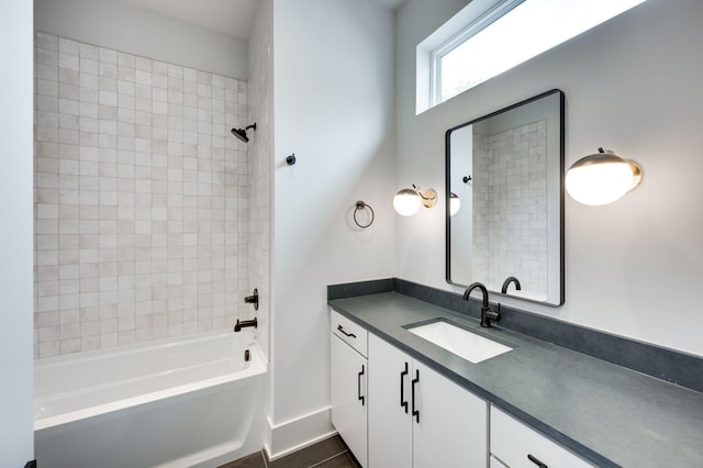 bathroom with tile patterned floors, vanity, and tub / shower combination