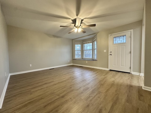 entryway featuring wood-type flooring and ceiling fan