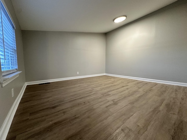 empty room featuring hardwood / wood-style flooring