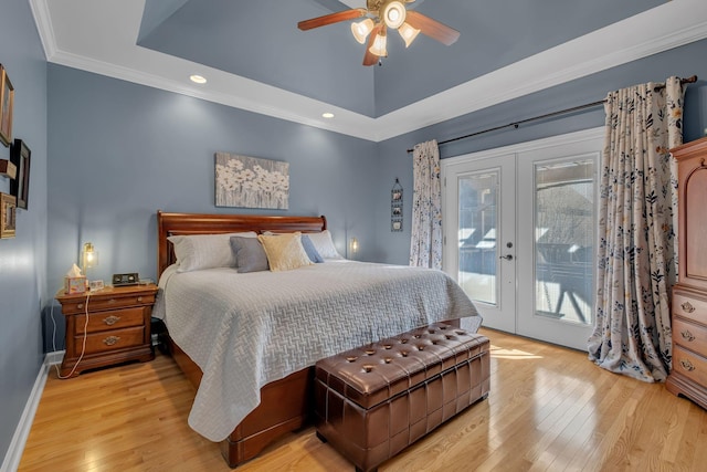 bedroom featuring access to outside, ceiling fan, french doors, and light hardwood / wood-style flooring