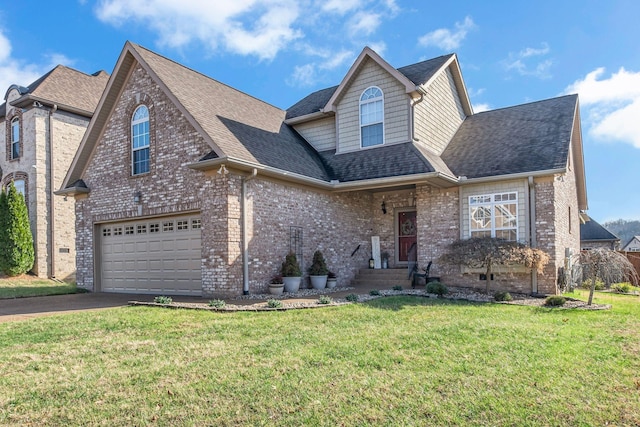 front facade featuring a garage and a front lawn