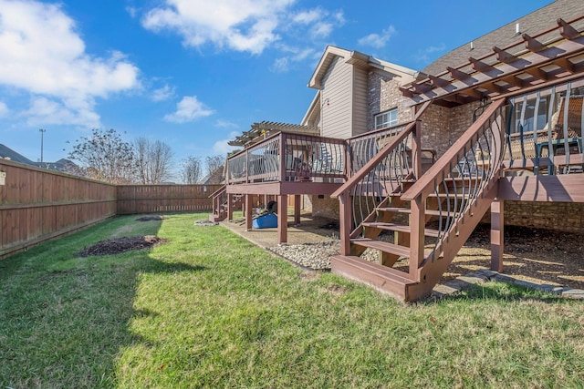 view of yard featuring a pergola and a wooden deck