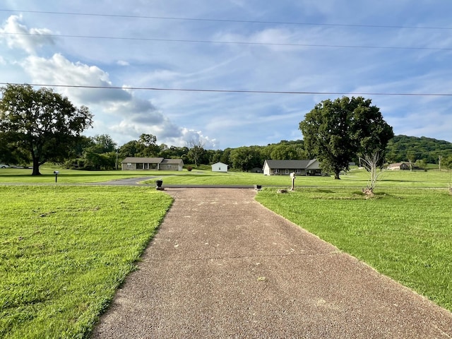 exterior space with a yard