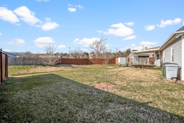 view of yard with a storage unit