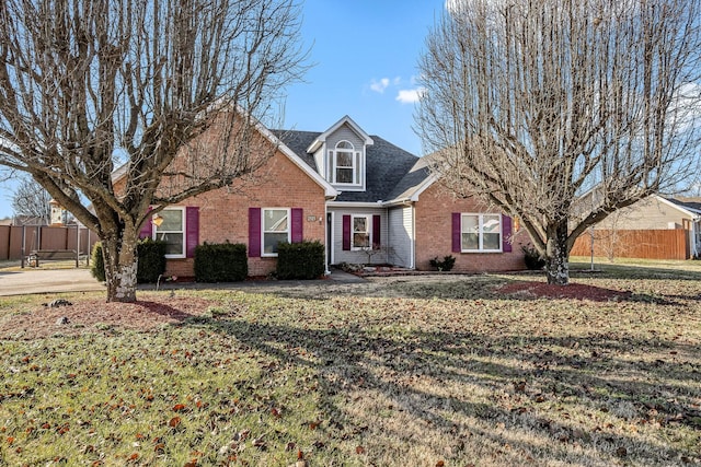 view of front of house featuring a front lawn