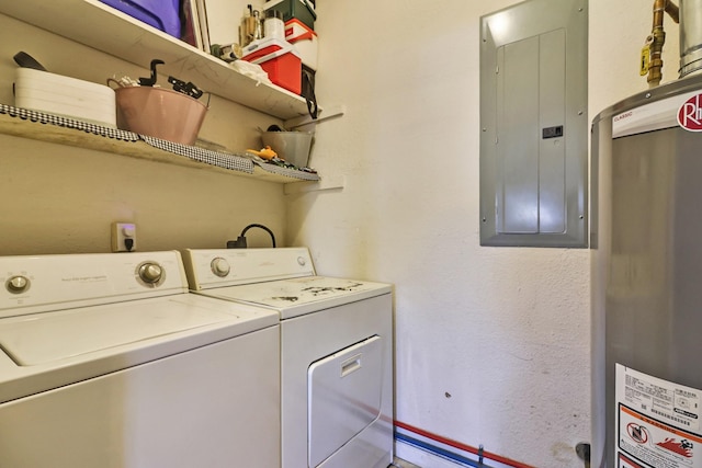 laundry area featuring washer and dryer, electric panel, and water heater