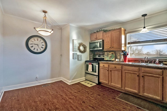 kitchen featuring hanging light fixtures, sink, dark hardwood / wood-style floors, appliances with stainless steel finishes, and tasteful backsplash