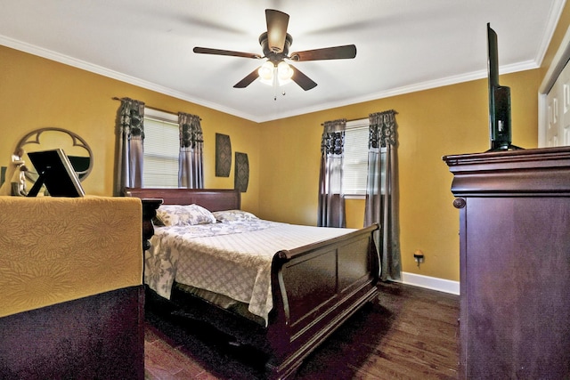 bedroom featuring ceiling fan, dark hardwood / wood-style flooring, and crown molding