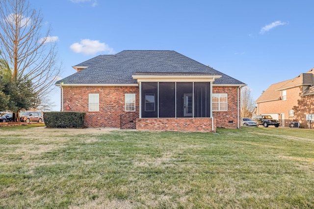 rear view of property with cooling unit, a lawn, and a sunroom