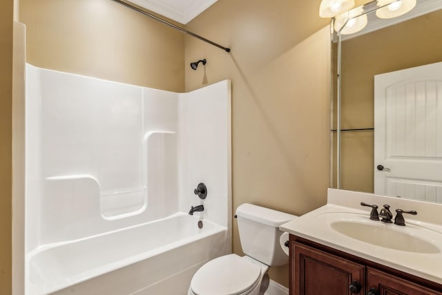 full bathroom with vanity, crown molding,  shower combination, and toilet