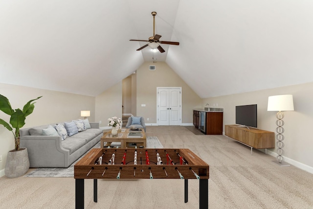 living room featuring vaulted ceiling and light colored carpet