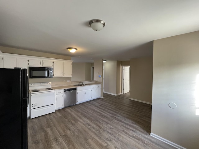 kitchen with dark wood-type flooring, white cabinetry, sink, and black appliances