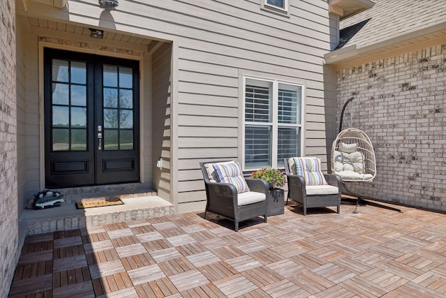 doorway to property featuring french doors