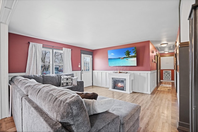 living room with light hardwood / wood-style flooring