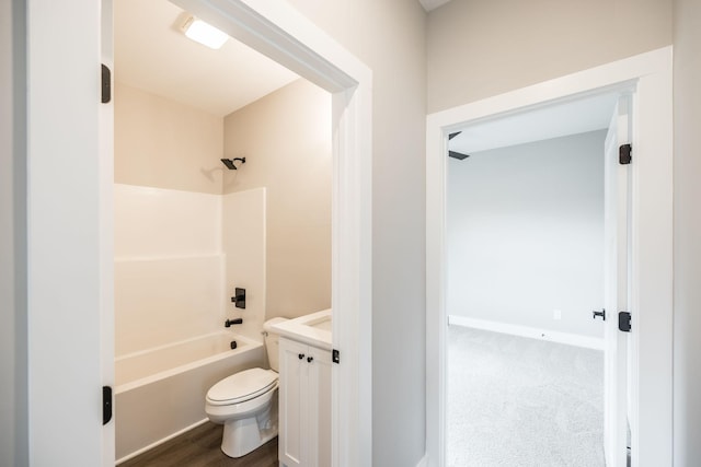 full bathroom with vanity, toilet, and washtub / shower combination