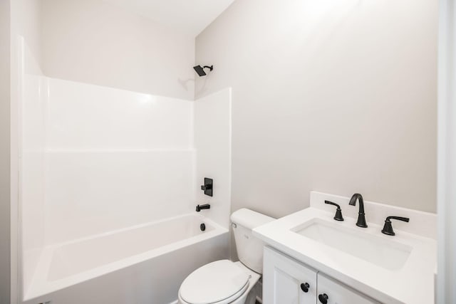 full bathroom featuring vanity, toilet, and  shower combination