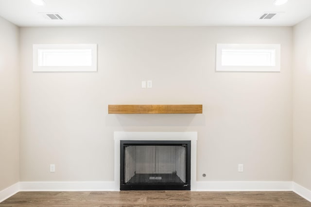 interior details featuring wood-type flooring