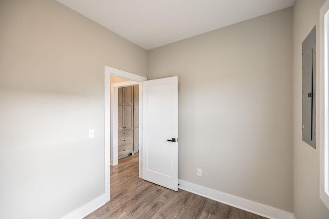 spare room featuring hardwood / wood-style floors