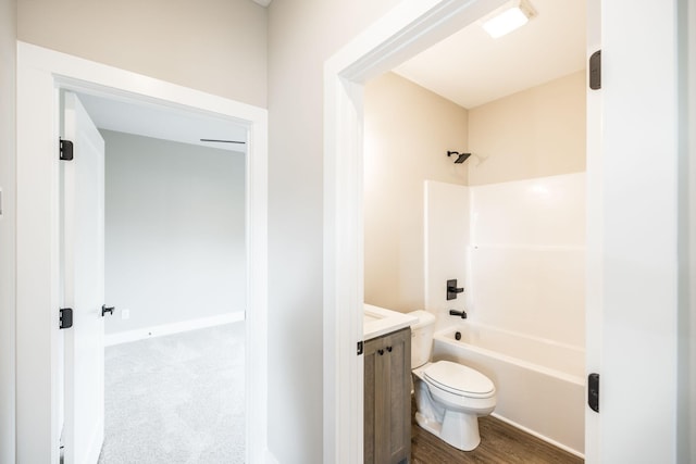 full bathroom with vanity, toilet, and shower / washtub combination