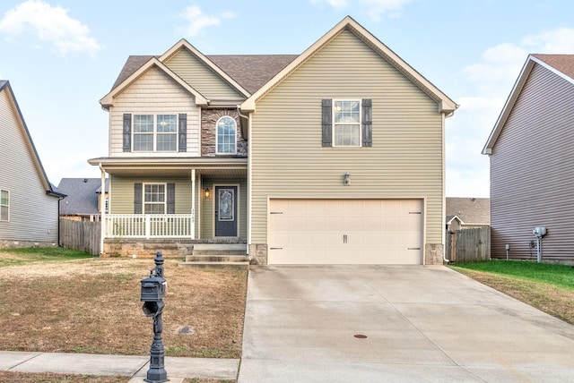 view of front of house with covered porch and a garage