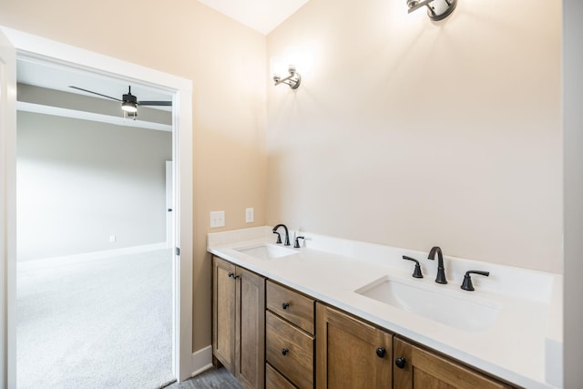 bathroom with vanity and ceiling fan