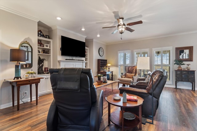 living room featuring built in shelves, hardwood / wood-style floors, and ornamental molding