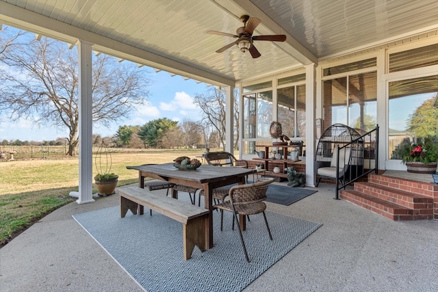 view of patio featuring ceiling fan