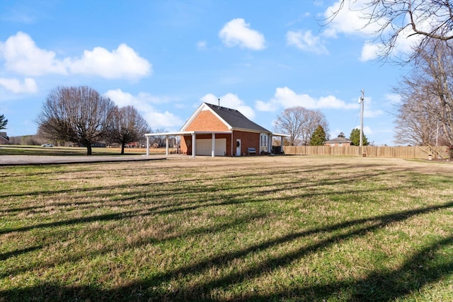 view of yard featuring a garage