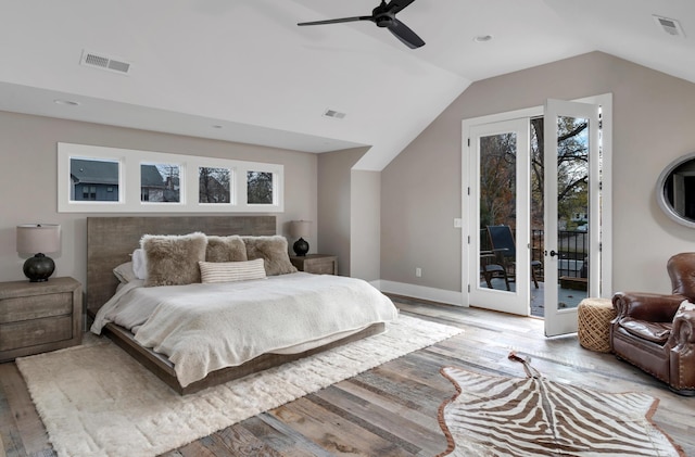 bedroom featuring ceiling fan, lofted ceiling, access to outside, and light hardwood / wood-style flooring