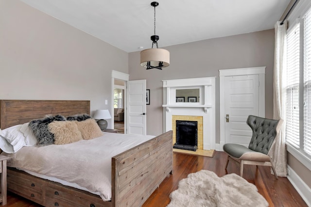 bedroom featuring dark hardwood / wood-style flooring